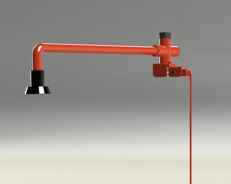 Red emergency-shower pipe with the new valve mounted below the shower head